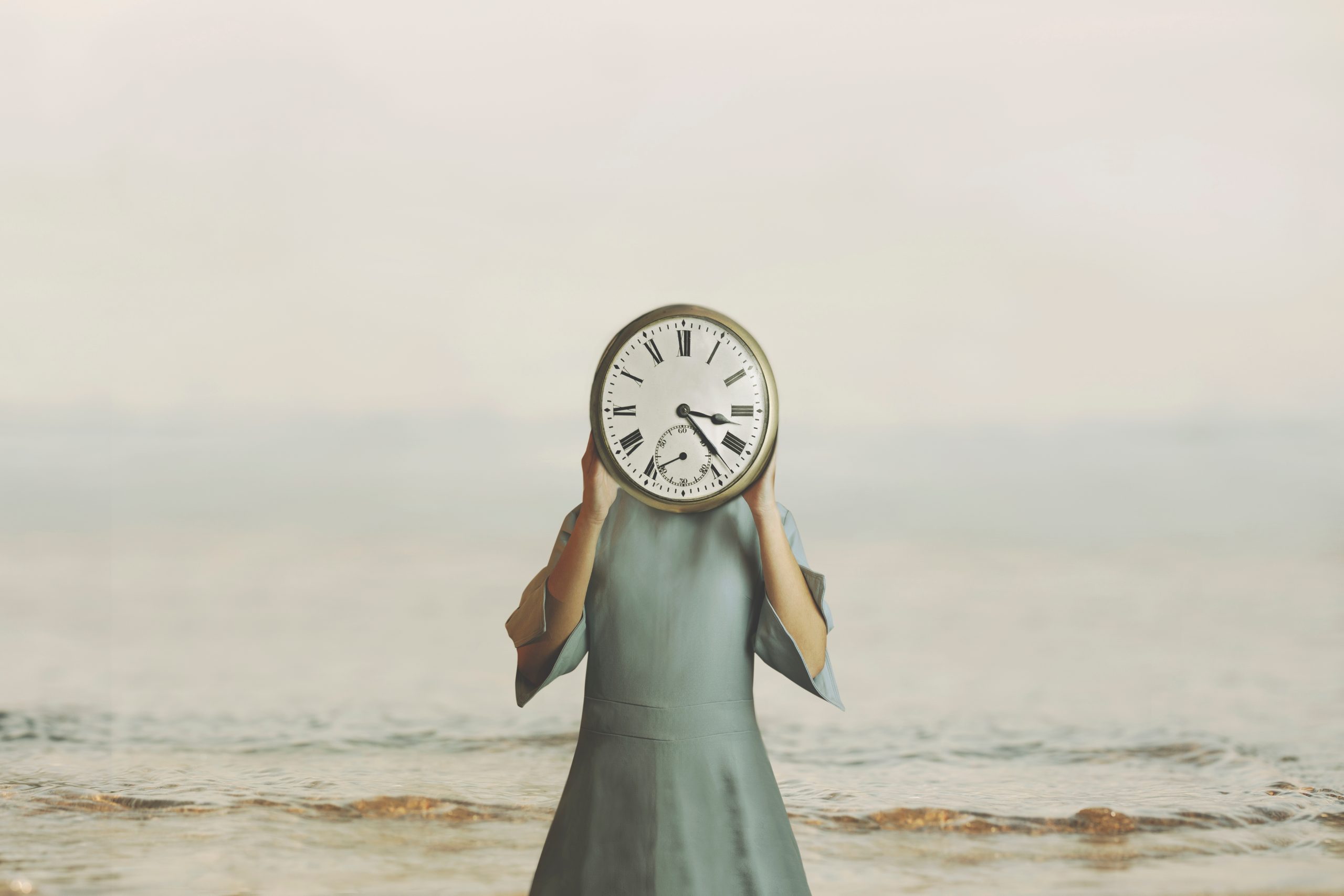 Surreal,Woman,With,Clock,In,Place,Of,Face,Checks,Time